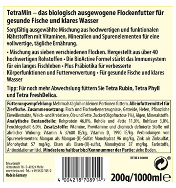 TetraMin (Hauptfutter für alle Zierfische in Flockenform, für ein langes und gesundes Fischleben und klares Wasser, plus Präbiotika für verbesserte Körperfunktionen und Futterverwertung), 1 Liter Dose - 3